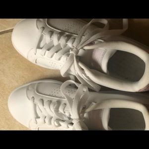 Women’s adidas shoes with pink accents